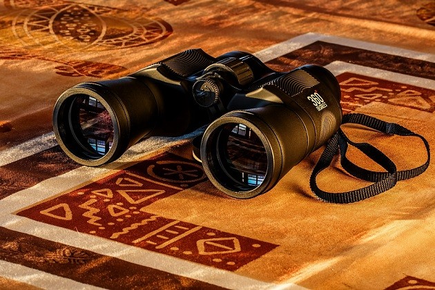 Business website blog - binoculars to depict SEO and online visibility