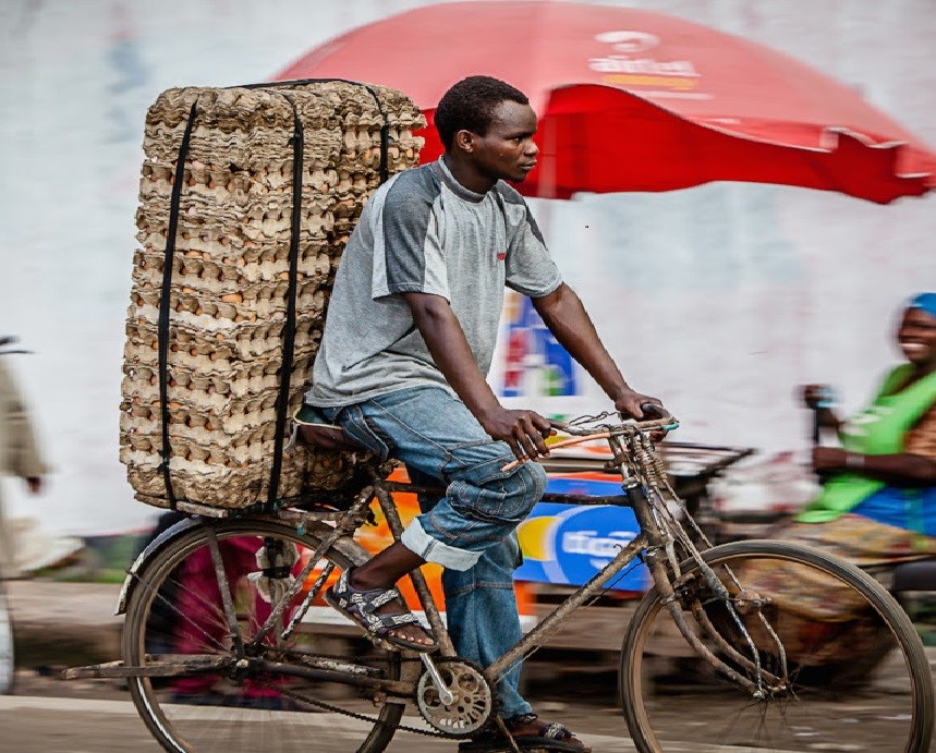 African rural e-commerce - man on wheels picture by Jumia