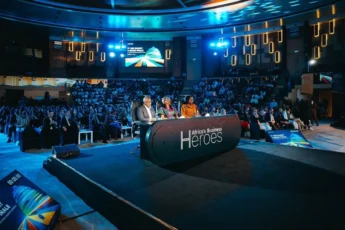Africa's Business Heroes 2025 grand finale event with judges on stage and a large audience in attendance.