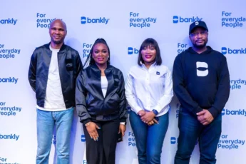 Picture with backdrop of Bankly and team to showcase story of Bankly's acquisition
